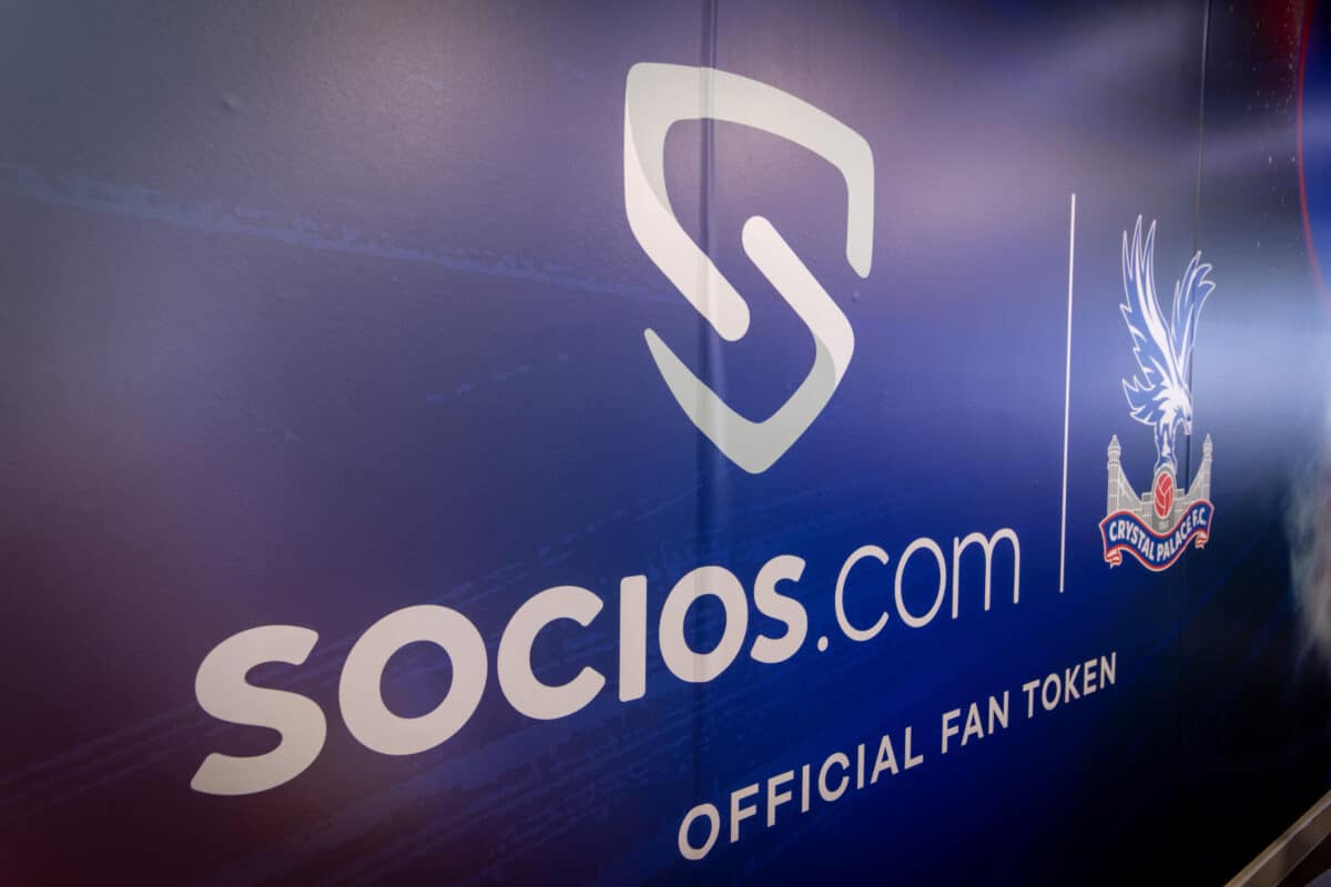 socios.com logo in an executive box wall